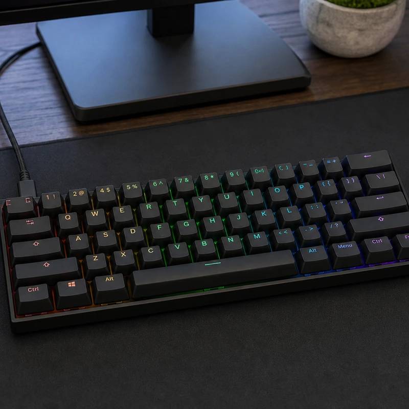 Wooting 60HE+ compact wired gaming keyboard on a desk